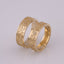 "Vyshyvanka" wedding rings with an ornament of coded words