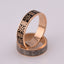 "Vyshyvanka" wedding rings with an ornament of coded words