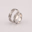 "Vyshyvanka" wedding rings with an ornament of coded words