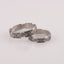 "Vyshyvanka" wedding rings with an ornament of coded words